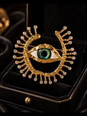 Gold Eyelash Eye Brooch with Teal and Blue Iris